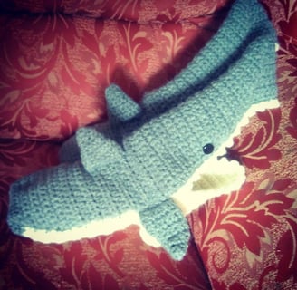 Crocheted shark slippers made to order.