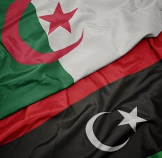 a close up of a flag of the country of Algeria and Libya
