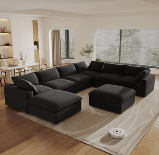 a living room with a couch and a robot vacuum