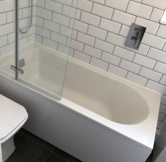 rupert de la mare white tile installation and bath and toilet