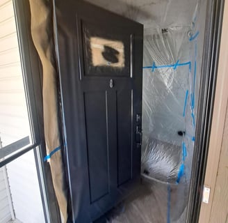 black door spray painted in Brighton by Rupert De La Mare