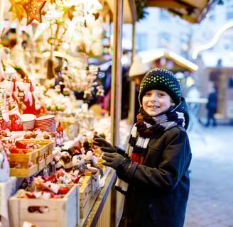 Winter, Best Time to Visit Bergen, Bergen Christmas market with wooden stalls and festive lights