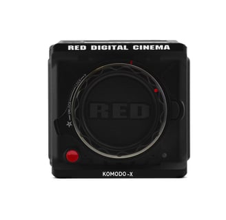 a red camera with a red digital camera attached to it