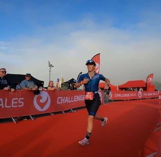 a women competing in Challenge Wales triathlon