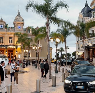 a nice car in front of Monte Carlo's Place du Casino
