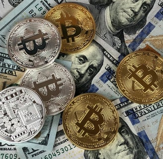 a bunch of bitcoin coins sitting on top of a pile of money