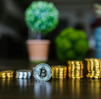 a stack of coins with a bitcoin bitcoin coin on top of