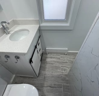 tile flooring and bathroom lighting