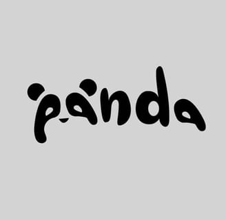 a black and white photo of a panda bear