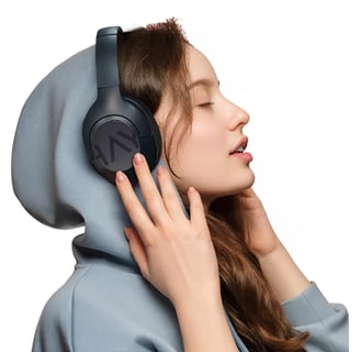 a woman in a hoodie with a hoodie and headphones