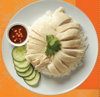 a plate of rice with a sauce and cucumber