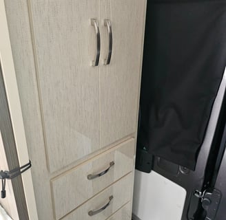 Wardrobe of barely used 2023 Entegra Coach Ethos 20T Class B RV for sale.