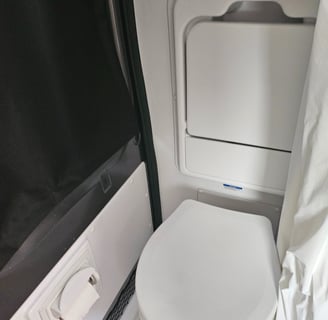 Practical bathroom of barely used 2023 Entegra Coach Ethos 20T Class B RV for sale.