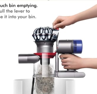 Dyson V8 Animal Handheld Vacuum Cleaner in use