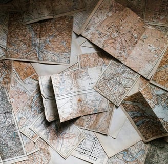 A selection of maps, messily overlayed over one another.