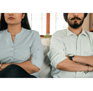 couple arguing, locked in a power struggle