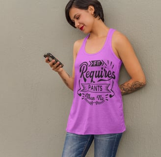 a woman in a tank top with a cell phone