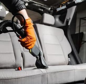 Professional interior steam cleaning of car seats and carpets