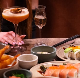 a table with a variety of food and drinks