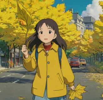 Una niña con una hoja en la mano, en otoño