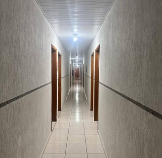 corredor de acesso aos quartos