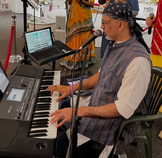 Rajan Bhai singing Garba while playing the Keyboard