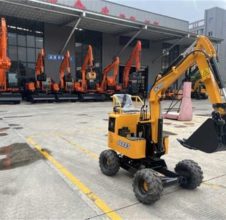 a small excavator with a crane on the back of it