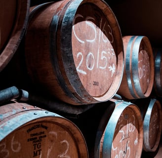 Photo by Arthur Brognoli: https://www.pexels.com/photo/pile-of-brown-wooden-barrels-2440529/