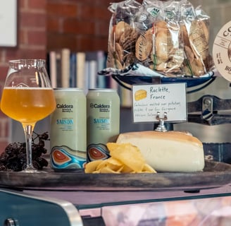 Photo by suellen baker: https://www.pexels.com/photo/beer-and-cheese-in-a-deli-26825060/