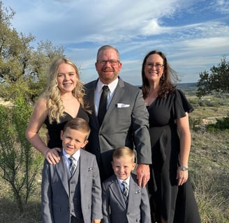 Andrew and family at a family wedding
