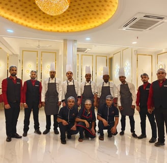 a group of chefs and their staff members