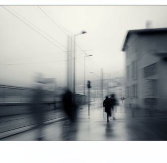a blurry photo of people walking down a street