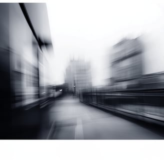 a black and white photo of a city street