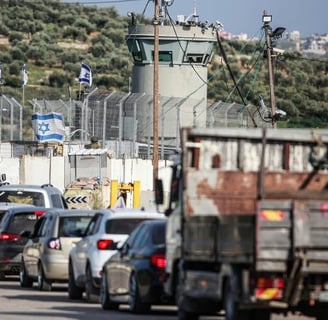Palestinian vehicles queued at long lines in Qalqilya checkpoint, West Bank, amid Israeli military r