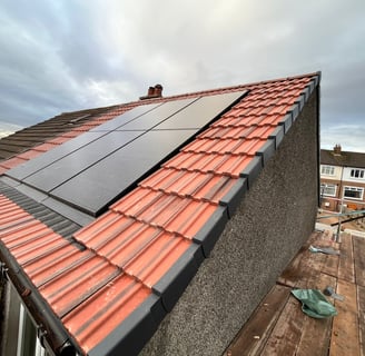 high quality new roof with solar panels and dry ridges and dry verges