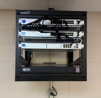 unifi network rack with unifi switches and a unif UDM SE