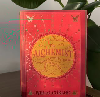 a book cover of the Alchemist