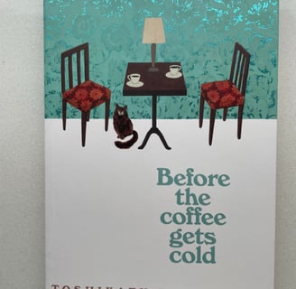 a book cover of before the coffee gets cold