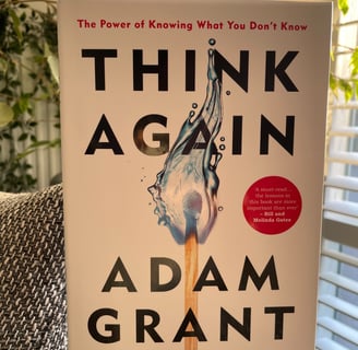 a book cover of think again 