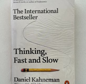 a book cover of Thinking Fast and Slow