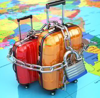 a group of luggage bags with luggage on a map of the world