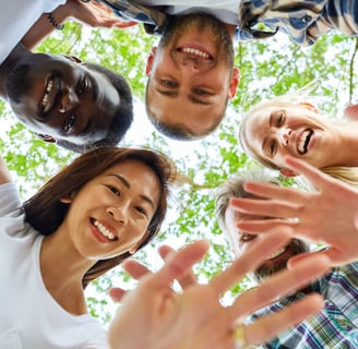 a group of people standing in a circle