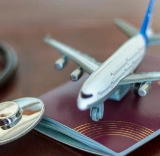 a passport and a stethoscope on a table