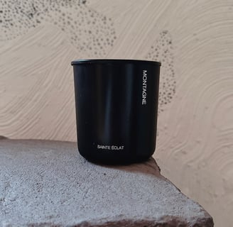 natural hand poured luxury candle illuminating pine and earth