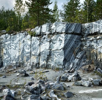 Abandoned marble quarry with multiple layers in the cut