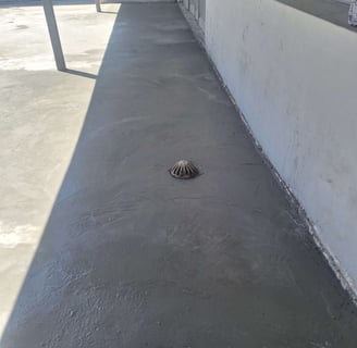 Specialized waterproofing screeded to a fall towards drainage system, Harbor Bay Mall, Cape Town, False Bay