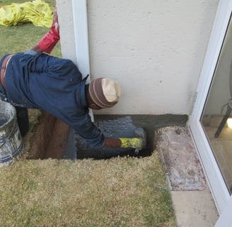 Specialized sealer coat application for foundation layer bricks below ground level to prevent ingress, Randburg
