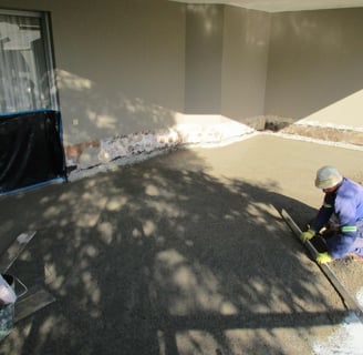 Screeding balcony to an adequate fall for water run off, Fourways Gardens, Fourways