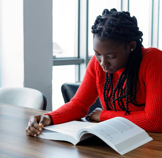 A Cambridge Maths Students studying diligently