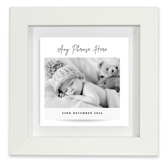 a baby's birth announcement card with a baby in a white frame